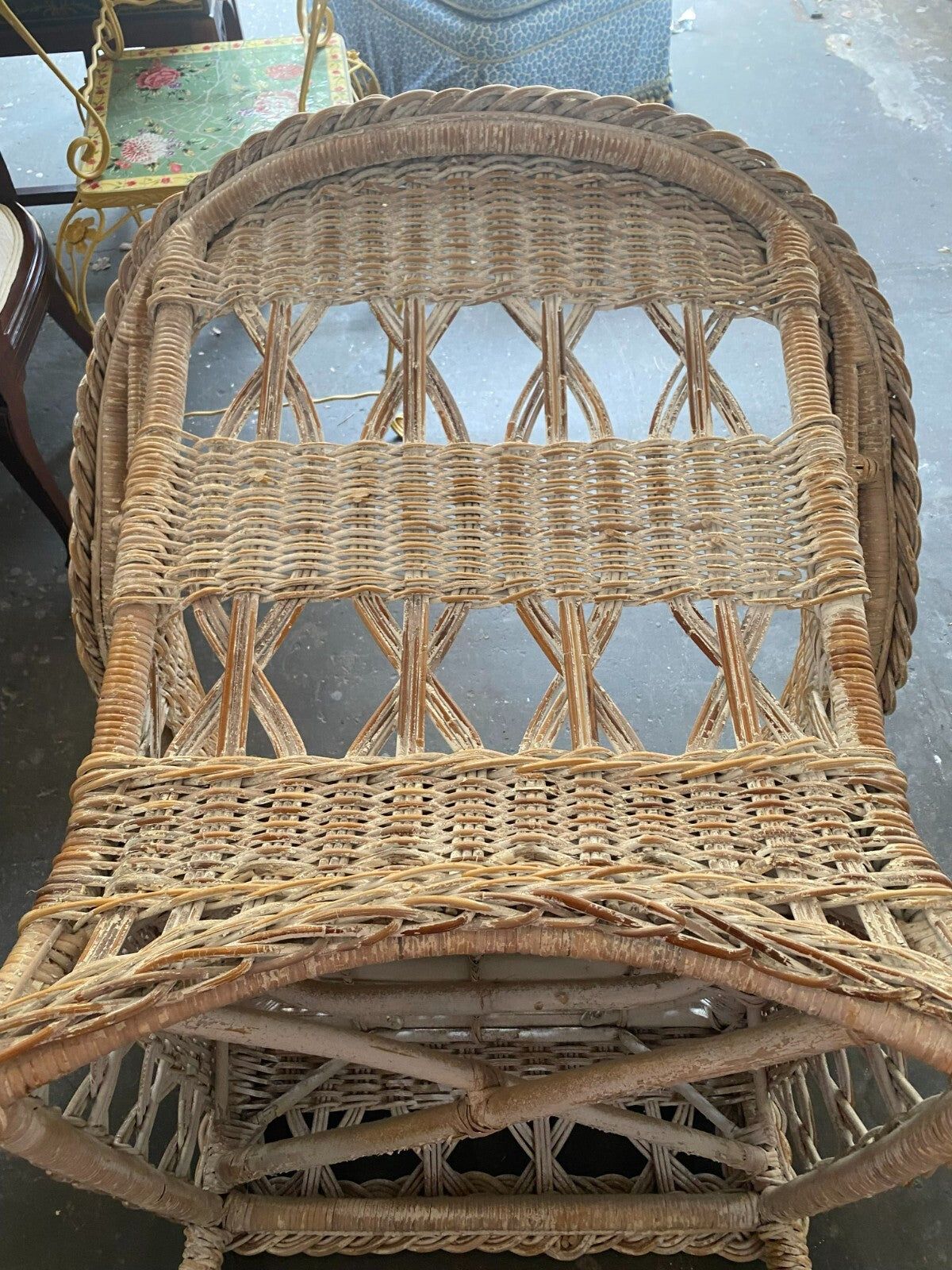 Beige Wicker Chair With Arm Rest Blue Cushion And Square Matching Ottoman