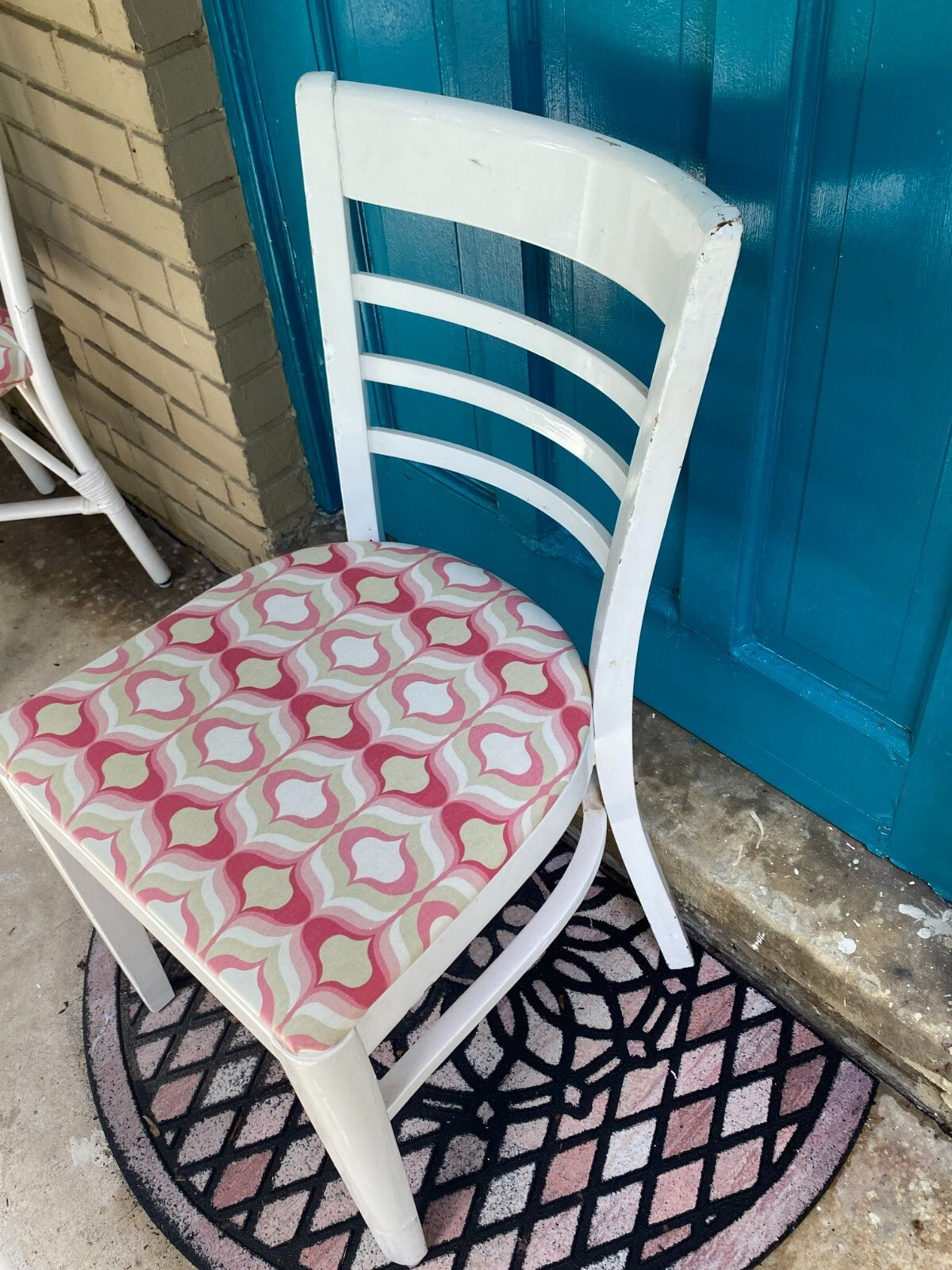 White Wooden Accent Chair With Pink/White Geometric Cushion