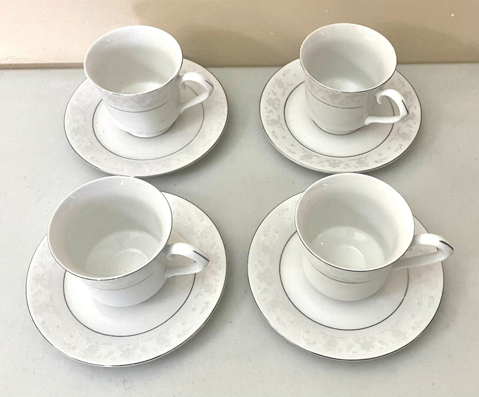China Classic White With Floral Design Set Of 4 Fine China Cups And Saucers