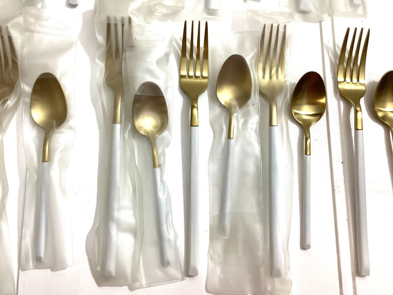 5 Sets Of 4 Golden With White Handle Flatware