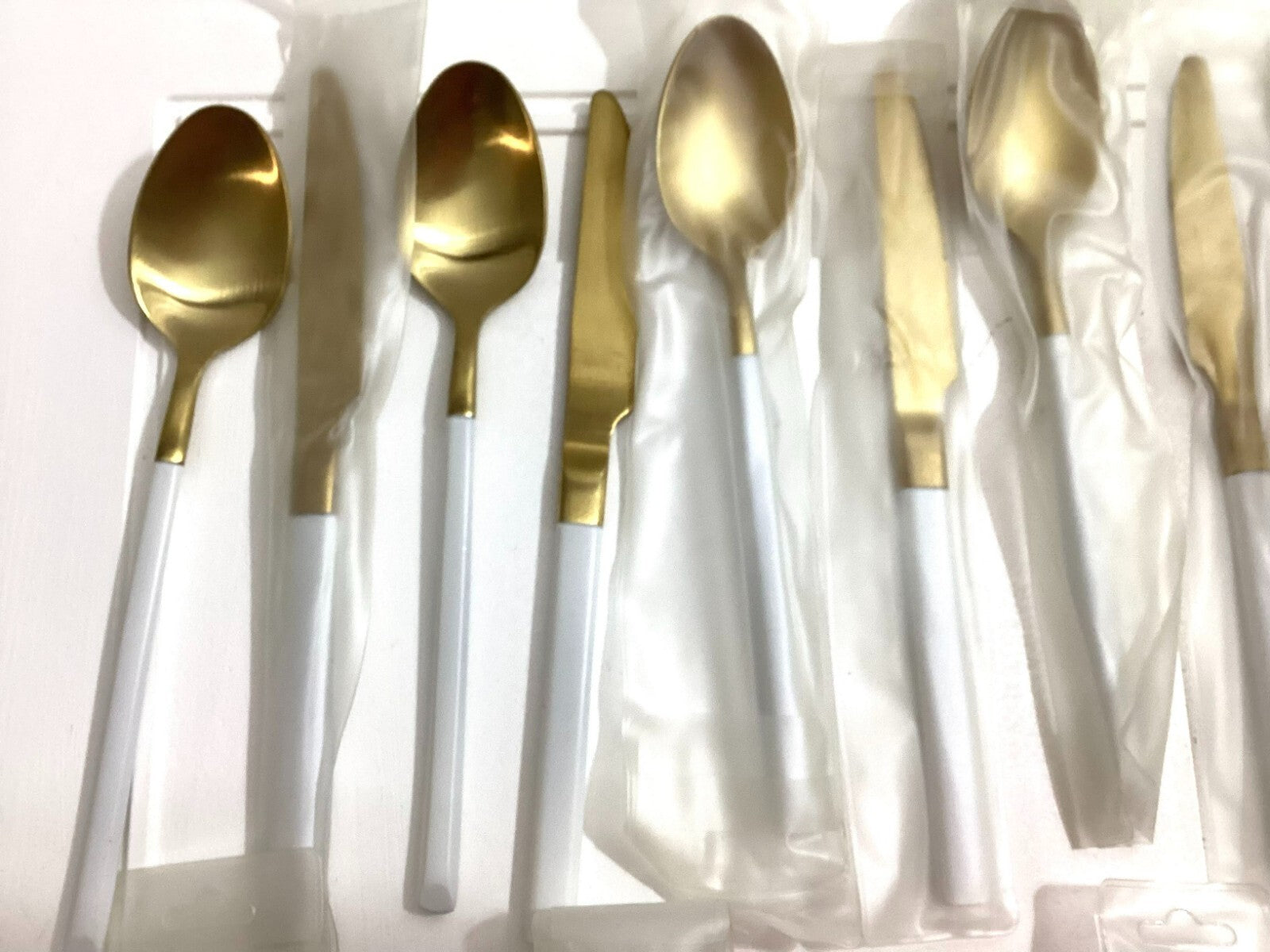5 Sets Of 4 Golden With White Handle Flatware