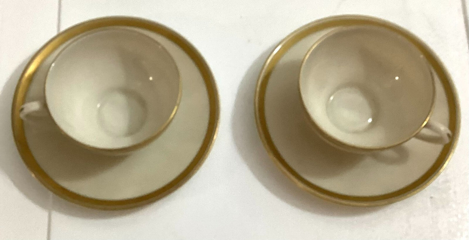 Set Of 2 Lunning Inc. White With Gold Trim Edge Coffee Cups And Saucers