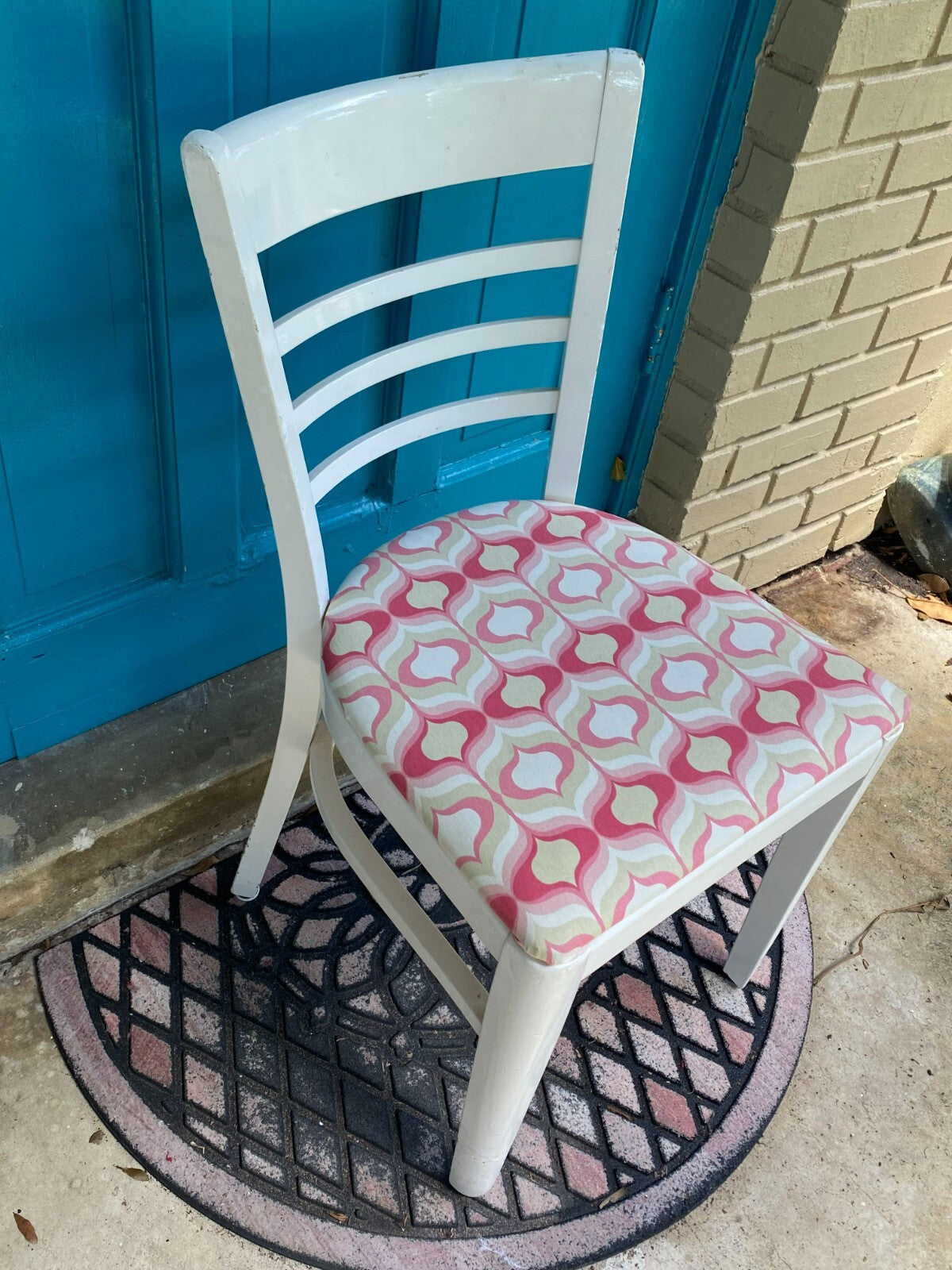 White Wooden Accent Chair With Pink/White Geometric Cushion
