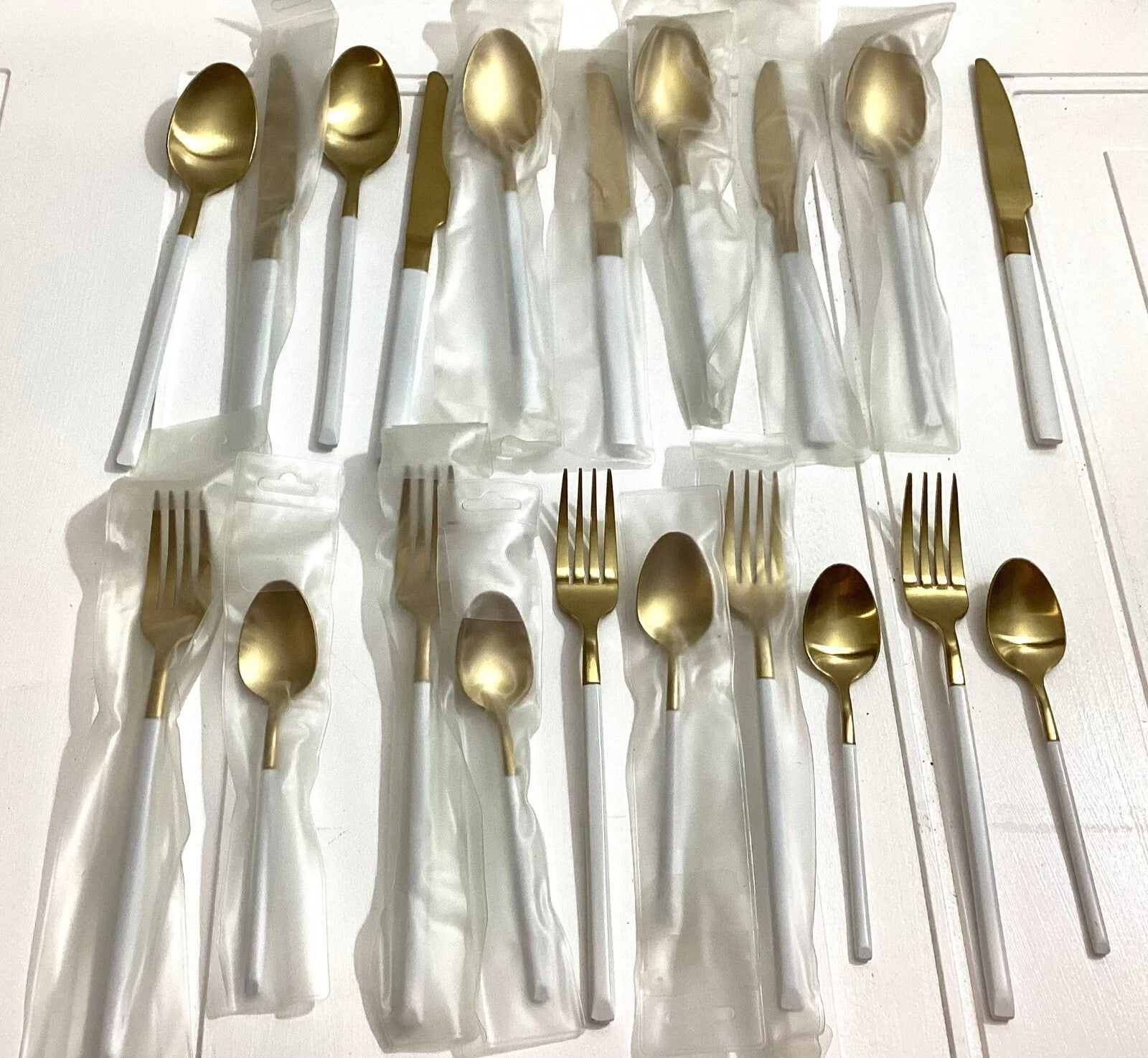 5 Sets Of 4 Golden With White Handle Flatware